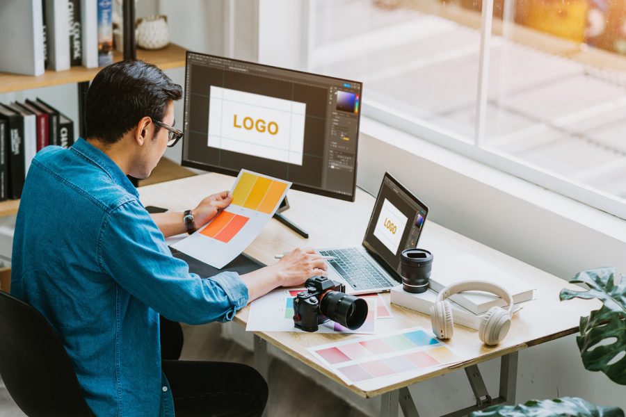 Young,Asian,Designer,Working,At,Office Young Asian designer working at office